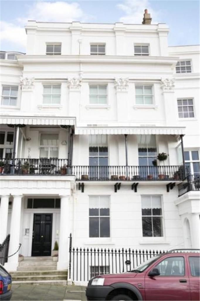 Front exterior of the property on Lewes Crescent, a Regency terrace in Kemp Town, Brighton